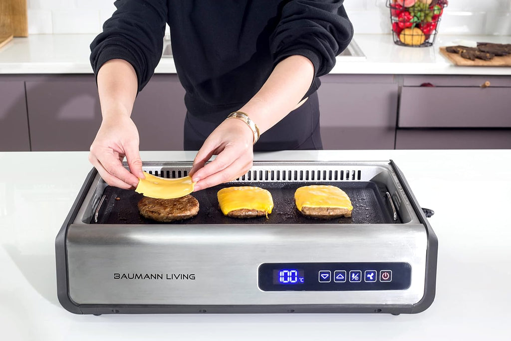 Indoor Smokeless Grill 1500W with Smart LED Touch Screen, Tempered Glass Lid, 2 Removable Ceramic Nonstick Grill & Griddle Plate, in a Modern Stainless Steel Design.