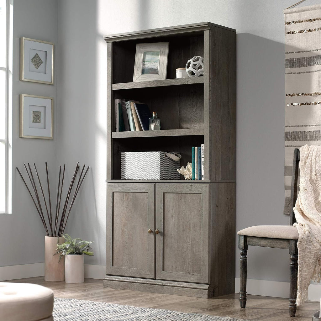 Sauder Select Book Shelf, Bookshelf with Storage, Library Bookcase with Doors and Adjustable Shelves, in Mystic Oak